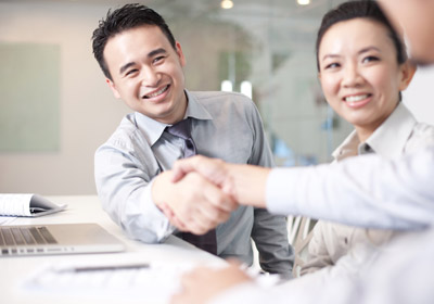 Business-handshake for financial planning insurance