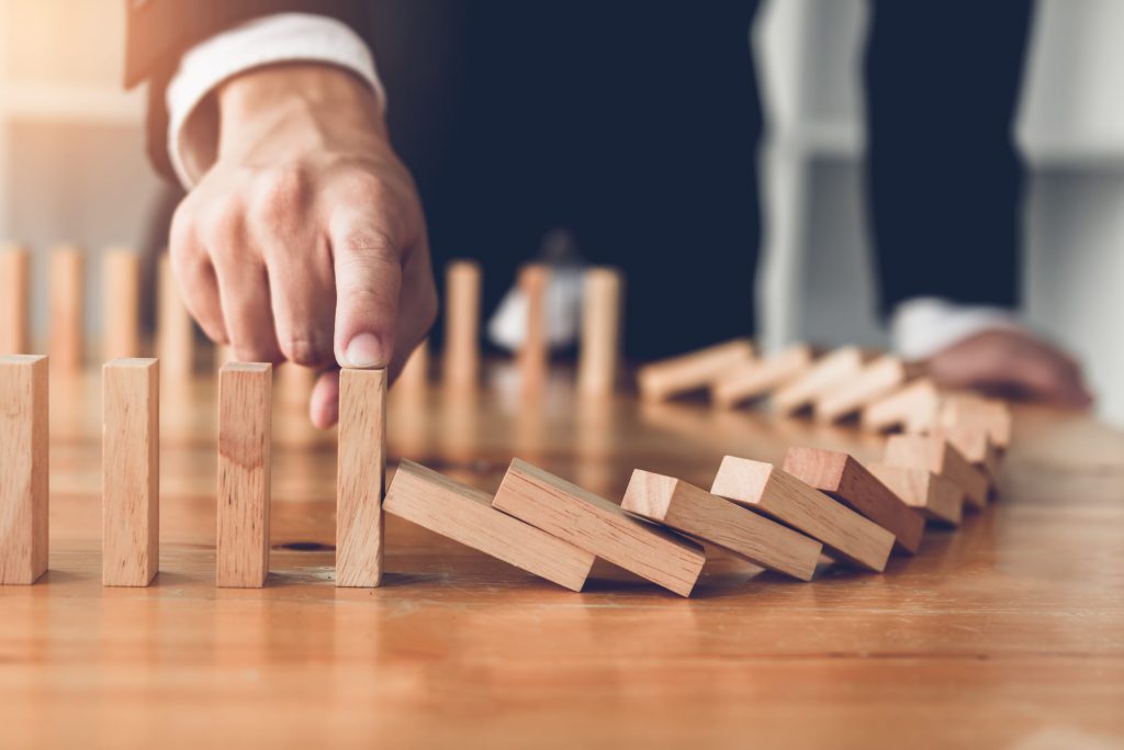 guy playing dominoes