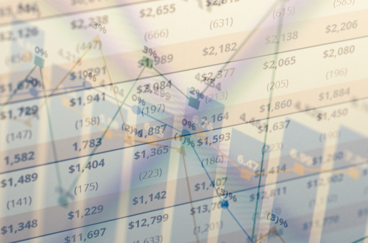 yield curve and close-up computer screen with financial data. Multiple exposure photo.