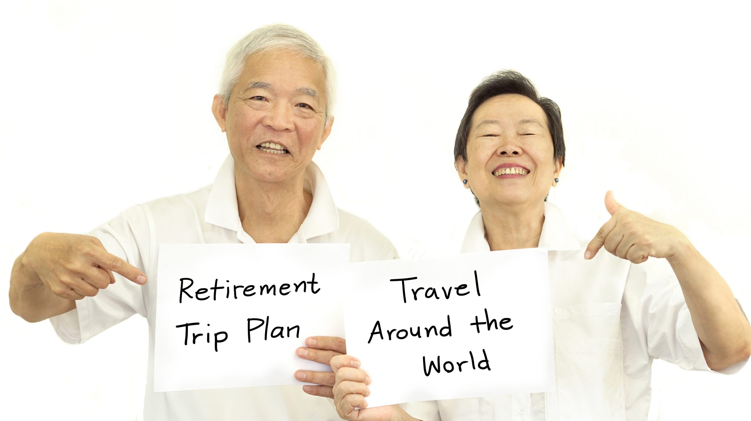 Happy Asian senior couple planning retirement trip to travel around the world