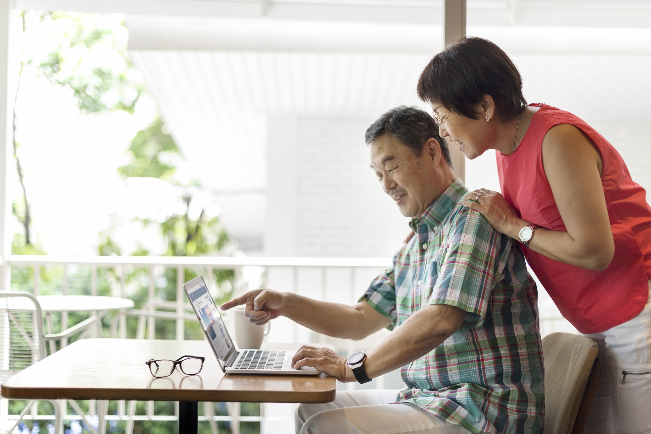 Senior Couple Using Laptop Concept